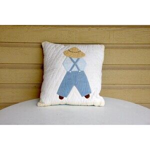 Little Boy Quilted Decorative Pillow, child in hat, pants, and suspenders